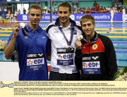 100m Brust der Herren, Siegerehrung. Bild zeigt Yakov Yan Toumarkin (ISR), Aristeidis Grigoriadis (GRE) und Helge Meeuw (GER) mit den Medaillen. 