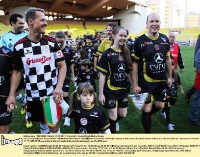 22.05.2012- Michael Schumacher (GER) Mercedes AMG F1 and HSH Prince Albert of Monaco (MON) at the charity football match. 