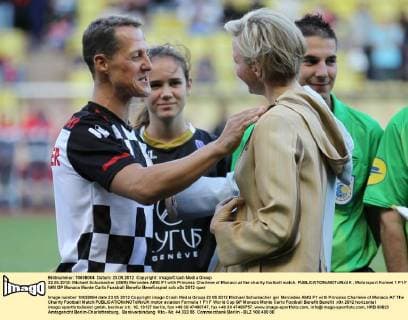 22.05.2012- Michael Schumacher (GER) Mercedes AMG F1 with Princess Charlene of Monaco at the charity football match. 