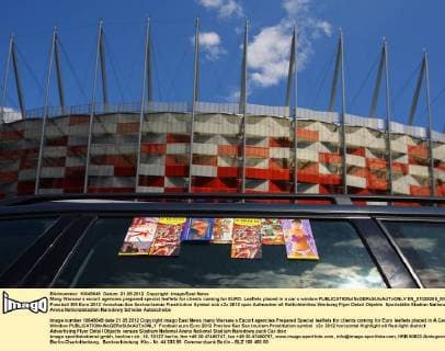 Many Warsaw s escort agencies prepared special leaflets for clients coming for EURO. Leaflets placed in a car s window  EN_01028265_0005