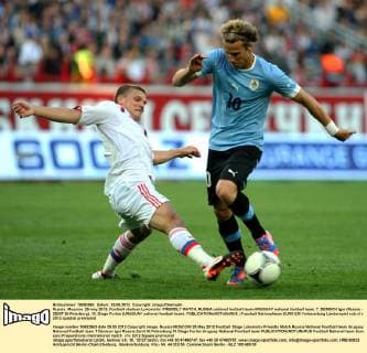 Russia. Moscow. 25 may 2012. Football stadium Lokomotiv. FRIENDLY MATCH. RUSSIA national football team-URUGUAY national football team. 7. DENISOV Igor (Russia - ZENIT St-Peterburg), 10. Diego Forlan (URUGUAY national football team). 
