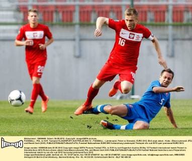 FUSSBALL - POL vs SVK, Testspiel KLAGENFURT,AUSTRIA,26.MAI.12 - FUSSBALL - Länderspiel, Polen vs Slowakei, EURO 2012. Bild zeigt Jakub - Kuba - Blaszczykowski (POL) und Marek Cech (SVK). 