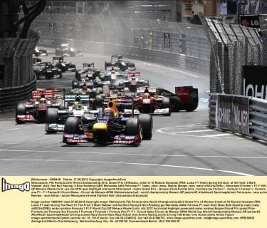 Motorsports: FIA Formula One World Championship 2012, Grand Prix of Monaco, crash of 10 Romain Grosjean (FRA, Lotus F1 Team) during the start, at the front: 2 Mark Webber (AUS, Red Bull Racing), 8 Nico Rosberg (GER, Mercedes AMG Petronas F1 Team), start, mass, Masse, Menge, viele, many xHOCHxZWEIx