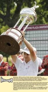 May 27, 2012 - Fort Worth, TX, USA - Zach Johnson holds the Leonard trophy after winning the Crowne Plaza Invitational at Colonial in Fort Worth, Texas, on Sunday May 27, 2012. Colonial Sunday - ZUMAm67