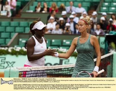 01.06.2012 Paris, France. Sloane Stephens and Mathilde Johansson shake hands following their match on day 6 of the French Open Tennis from Roland Garros. xCraigxDoylex  ActionPlus11284970