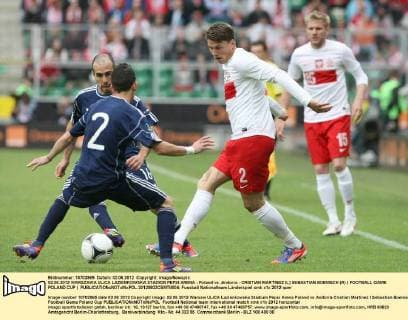 02.06.2012 WARSZAWA ULICA LAZIENKOWSKA STADION PEPSI ARENA - Poland vs. Andorra - CRISTIAN MARTINEZ (L) SEBASTIAN BOENISCH (R) ( FOOTBALL GAME POLAND CUP )  20120602CSMT8004