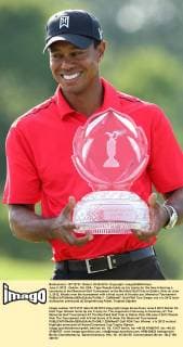 June 3, 2012 - Dublin, OH, USA - Tiger Woods holds up his trophy for the fans following a ceremony at the Memorial Golf Tournament at the Muirfield Golf Club in Dublin, Ohio on June 3, 2012. Woods won the tournament with a final score of 9-under par. Memorial Tournament - ZUMAm67