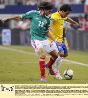 June 3, 2012 - Arlington, Texas, USA - June 3, 2012. Arlington, Texas, USA. Gerardo Lugo (23) of Mexico defends against Aguiar Wellington (17) of Brazil in the second half as the Brazilian National soccer team played the Mexican National soccer team at Cowboys Stadium in Arlington, Texas. Mexico defeated Brazil 2 to 0. Soccer Brazil Mexico - ZUMAl92