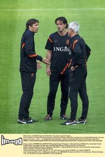 (L-R) assistant coach Phillip Cocu,assistant coach Ernest Faber,coach Bert van Marwijk of Holland Netherlands Training Session Training - 2012 - xVIxMAURICExVANxSTEENxIVx 960522