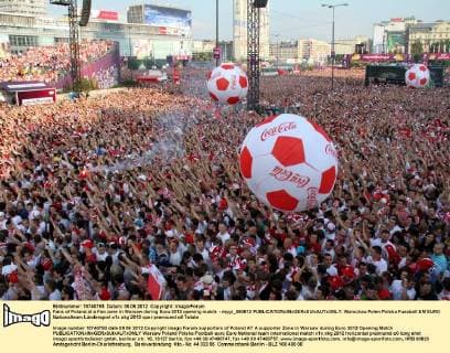 Fans of Poland at a Fan zone in Warsaw during Euro 2012 opening match - mygr_080612 