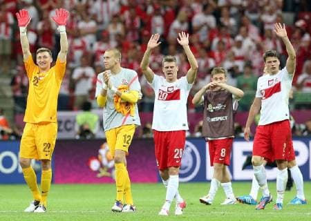 The opening game at EURO 2012 Poland vs. Greece host at the National Arena on June 8, 2012 in Warsaw, Poland. Polish players after the game wave s to people, from left: Przemyslaw Tyton, Grzegorz Sandomierski, Lukasz Piszczek, Maciej Rybus, Sebastian Boenisch - 