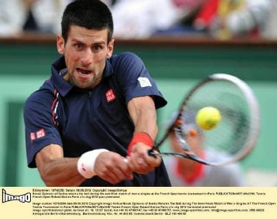 Novak Djokovic of Serbia returns the ball during the semifinal match of men s singles at the French Open tennis tournament in Paris 