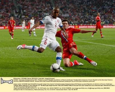 Football - European Championships 2012 - Russia vs. Czech Republic Yuri Zhirkov of Russia challenges Theodor Gebre Selassie of Czech Republic at the Municipal Stadium, Wroclaw 