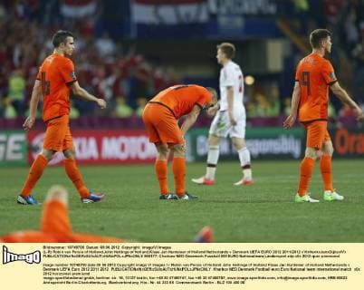 (L-R) Robin van Persie of Holland,John Heitinga of Holland,Klaas Jan Huntelaar of Holland Netherlands v Denmark UEFA EURO 2012 2011 2012 xVIxHenkxJanxDijksxIVx 965177
