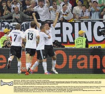 Mario Gomez (R) of Germany celebrates after scoring during the Group B match against Portugal at the Euro 2012 football championships in Lviv, Ukraine, June 9, 2012. Germany won 1-0. (Xinhua Ma Ning) (jyc) UKRAINE-LVIV-EURO 2012 FOOTBALL CHAMPIONSHIPS-GERMANY VS PORTUGAL 