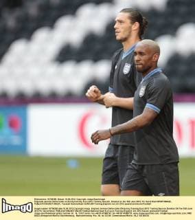 Englands Jermain Defoe looks on during training..Euro 2012 Training Session, Donetsk on the 10th June 2012. Pic David Klein SPORTIMAGE... EDITORIAL USE ONLY. No use with unauthorised audio, video, data, fixture lists, club league logos or live services. Online in-match use limited to 120 images, no video emulation. No use in betting, games or single club league player publications.