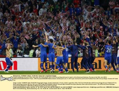 Croatia celebrate in front of their fans after the final whistle..Euro 2012 Group Stage (Group C) match, at the Municipal Stadium, Poznan on the 10th June 2012. EDITORIAL USE ONLY. No use with unauthorised audio, video, data, fixture lists, club league logos or live services. Online in-match use limited to 120 images, no video emulation. No use in betting, games or single club league player publications.