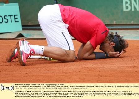 Spanish Rafael Nadal reacts after winning his French Open men s final match - Roland Garros in Paris - Nadals 7th French Open title -  PAR20120611704