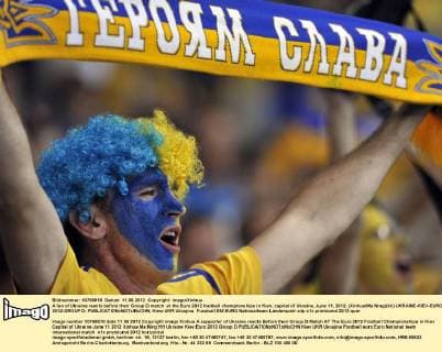 A fan of Ukraine reacts before their Group D match at the Euro 2012 football championships in Kiev, capital of Ukraine, June 11, 2012. (Xinhua Ma Ning)(kh) UKRAINE-KIEV-EURO 2012-GROUP D- 