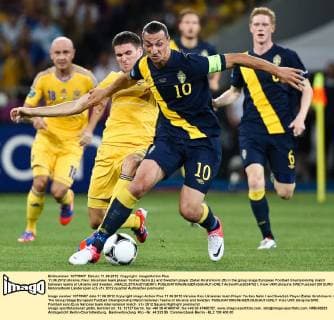 11.06.2012 Ukraine, Kiev: Ukrainian team player Yevhen Selin (L) and Swedish player Zlatan Ibrahimovic (R) in the group stage European Football Championship match between teams of Ukraine and Sweden. xMALOLETKAxEVGENIYx  ActionPlus20247621