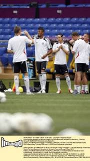 (L-R) Jerome Boateng of Germany,Mesut Özil and Benedikt Höwedes of Germany - Training Group B: EURO 2012 xVIxHenkxJanxDijksxIVx 971901