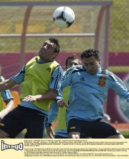 EURO 2012 - POLAND - Gniewino - 13 JUNE 2012 - Spain National Team official MD-1 training. Spanish players Santi Cazorla and Xavi Hernandez with the ball. 