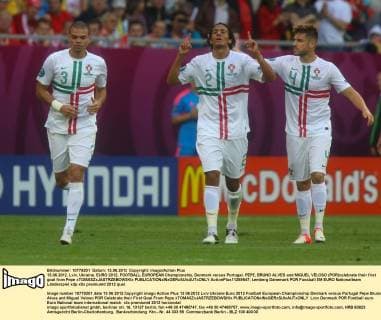 13.06.2012. Lviv, Ukraine. EURO 2012, FOOTBALL EUROPEAN Championship, Denmark versus Portugal. PEPE, BRUNO ALVES and MIGUEL VELOSO (POR)celebrate their first goal from Pepe xTOMASZxJASTRZEBOWSKIx  ActionPlus11289547