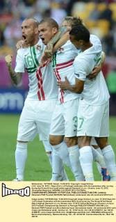 LVIV, June 13, 2012 -- Pepe (2nd L) of Portugal celebrates with his teammates after scoring during the Group B 2nd round match against Denmark in Lviv, Ukraine, June 13, 2012. (Xinhua Ma Ning) (jyc) UKRAINE-LVIV-EURO 2012 FOOTBALL CHAMPIONSHIPS-DENMARK VS PORTUGAL 