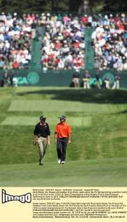 Andy Zhang, the 14-year-old amateur from China, walks down the 7th fairway during a practice round prior to the start of the 112th U.S. Open Championship at the Olympic Club in San Francisco, California on June 13, 2012.  SFP20120613208