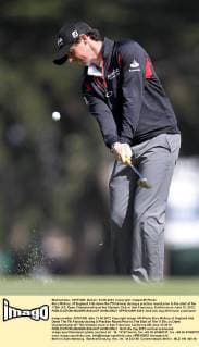 Rory McIlroy, of England, hits down the 7th fairway during a practice round prior to the start of the 112th U.S. Open Championship at the Olympic Club in San Francisco, California on June 13, 2012.  SFP20120613301