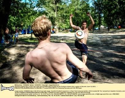 Swedish football fans in their tent camp during EURO 2012 located on the Turkhaniv Island, Kyiv, capital of Ukraine, June 12, 2012. - 