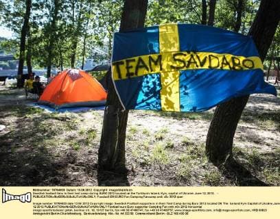 Swedish football fans in their tent camp during EURO 2012 located on the Turkhaniv Island, Kyiv, capital of Ukraine, June 12, 2012. - 
