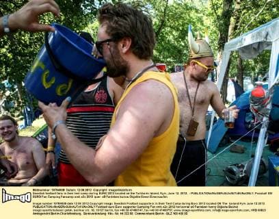 Swedish football fans in their tent camp during EURO 2012 located on the Turkhaniv Island, Kyiv, June 12, 2012. - 