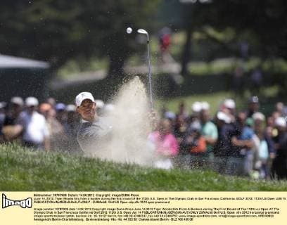 June 14, 2012: Tiger Woods hits from a bunker during the first round of the 112th U.S. Open at The Olympic Club in San Francisco, California. GOLF 2012: 112th US Open JUN 14 - ZUMAcb8
