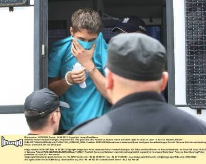 Detained Polish football hooligan, resposible for riots prior and post Poland vs. Russia match are taken taken to court on June 14, 2012 in Warsaw, Poland  EN_01033450_0006