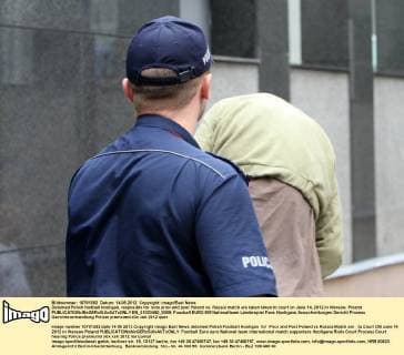 Detained Polish football hooligan, resposible for riots prior and post Poland vs. Russia match are taken taken to court on June 14, 2012 in Warsaw, Poland  EN_01033450_0009
