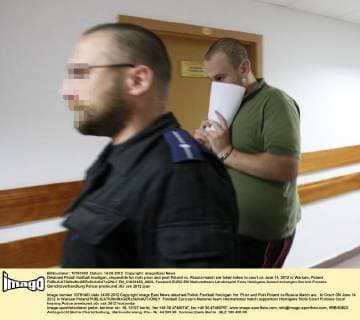 Detained Polish football hooligan, resposible for riots prior and post Poland vs. Russia match are taken taken to court on June 14, 2012 in Warsaw, Poland  EN_01033450_0023