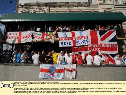 Football - European Championships 2012 - England fans take over a pub before kick off in Kiev 