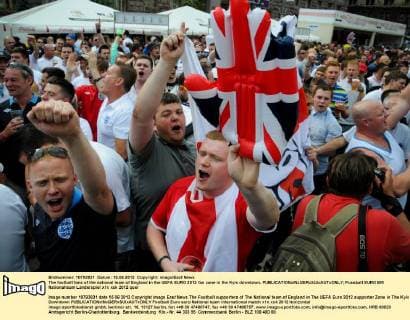 The football fans of the national team of England in the UEFA EURO 2012 fan zone in the Kyiv downtown. 