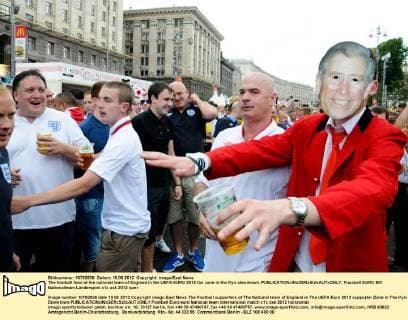 The football fans of the national team of England in the UEFA EURO 2012 fan zone in the Kyiv downtown. 