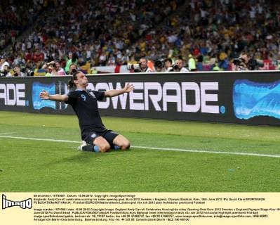 Englands Andy Carroll celebrates scoring his sides opening goal..Euro 2012 Sweden v England, Olympic Stadium, Kiev, 15th June 2012. Pic David Klein SPORTIMAGE EDITORIAL USE ONLY. No use with unauthorised audio, video, data, fixture lists, club league logos or live services. Online in-match use limited to 120 images, no video emulation. No use in betting, games or single club league player publications.