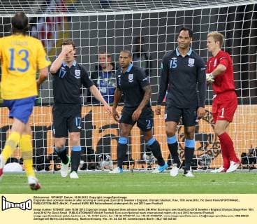 Englands Glen Johnson looks on after scoring an own goal..Euro 2012 Sweden v England, Olympic Stadium, Kiev, 15th June 2012. Pic David Klein SPORTIMAGE... EDITORIAL USE ONLY. No use with unauthorised audio, video, data, fixture lists, club league logos or live services. Online in-match use limited to 120 images, no video emulation. No use in betting, games or single club league player publications.