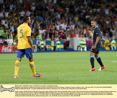 Englands Theo Walcott celebrates scoring his sides second goal..Euro 2012 Sweden v England, Olympic Stadium, Kiev, 15th June 2012. Pic David Klein SPORTIMAGE EDITORIAL USE ONLY. No use with unauthorised audio, video, data, fixture lists, club league logos or live services. Online in-match use limited to 120 images, no video emulation. No use in betting, games or single club league player publications.