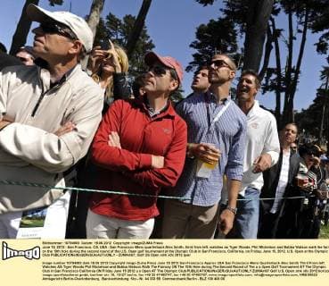 June 15, 2012 - San Francisco, CA, USA - San Francisco 49ers quarterback Alex Smith, third from left, watches as Tiger Woods, Phil Mickelson and Bubba Watson walk the fairway on the 10th hole during the second round of the U.S. Open golf tournament at the Olympic Club in San Francisco, California, on Friday, June 15, 2012. U.S. Open at the Olympic Club - ZUMAm67