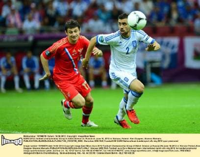 EURO 2012: football championship Group A match Greece vs. Russia on June 16, 2012 in Warsaw, Poland. Alan Dzagoev, Giannis Maniatis  EN_01033728_0002