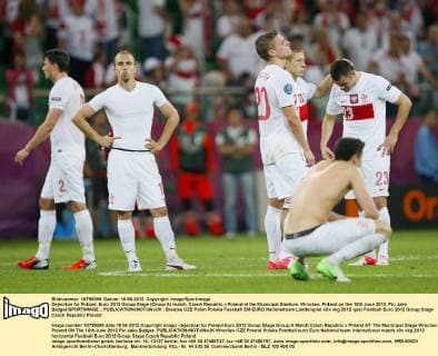 Dejection for Poland..Euro 2012 Group Stage (Group A) match, Czech Republic v Poland at the Municipal Stadium, Wroclaw, Poland on the 16th June 2012. Pic Jake Badger SPORTIMAGE... EDITORIAL USE ONLY. No use with unauthorised audio, video, data, fixture lists, club league logos or live services. Online in-match use limited to 120 images, no video emulation. No use in betting, games or single club league player publications.