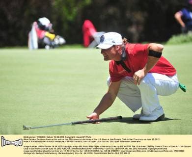 Alex Cejka of Germany lines up his putt on the 12th green on day three of the U.S. Open at the Olympic Club in San Francisco on June 16, 2012.  SFP2012061602