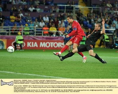 Football - European Championships 2012 - Portugal vs. Netherlands Christiano Ronaldo of Portugal scores their equalising goal (1-1) at the Metalist Stadium, Kharkiv, Ukraine 