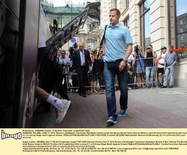 WARSAW, POLAND. JUNE 17, 2012. Russia s goalkeeper Vyacheslav Malafeyev boards a bus outside the Bristol Hotel. Russia failed to reach the Euro 2012 quaterfinal after losing 0-1 in a Group Stage match against Greece.  RE10153B