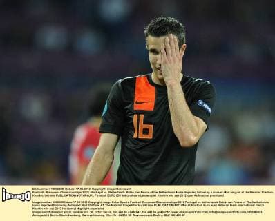 Football - European Championships 2012 - Portugal vs. Netherlands Robin Van Persie of the Netherlands looks dejected following a missed shot on goal at the Metalist Stadium, Kharkiv, Ukraine 